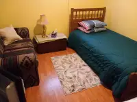 Cozy Room for Rent In the Heart of Bowness, NW.
