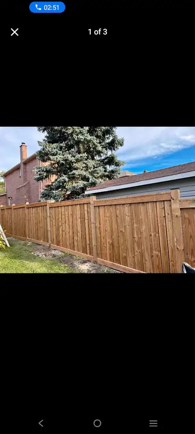 This is a well-built wooden fence, perfect for adding privacy and security to your property. It's in...