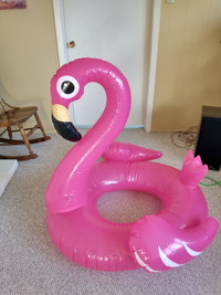 Large pink flamingo pool float
