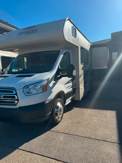 Ford Transit 3.7l Side and rear cameras Remote start Overhead bunk with safety net Queen walk around...