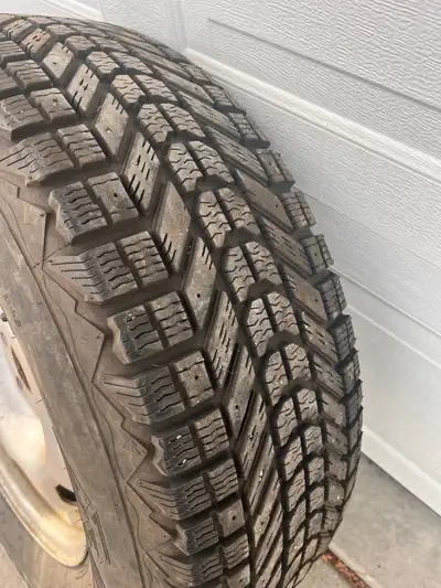 For sale a set of 4 Firestone WinterForce tires size P265/70R17 113S M+S, perfect for winter driving...