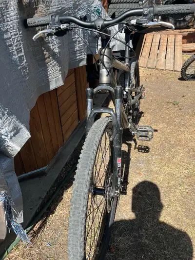 Tribal Tahiti3 Full Suspension Moutain bike Aluminum frame so it’s light I can pick it up with one h...