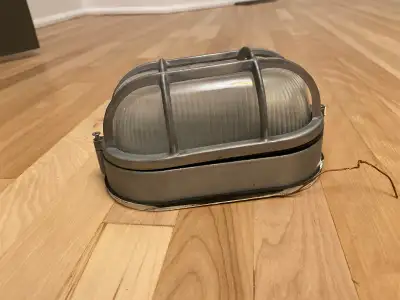 Free low profile, nautical light fixture, protective cover , View more