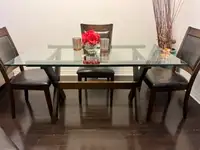 GLASS TOP SOLID WOOD BASE DINING TABLE