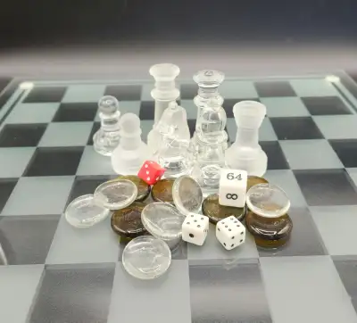 Checkers / Chess / Backgammon 3-in-1 Glass Board Game Set FEATURES: - Board Dimensions: 13.5'' (W) x...