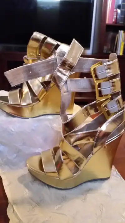 Gold Size 7 Killer boots on!! Worn once