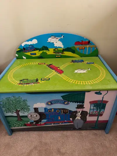 This is a Thomas the Tank Engine toy wooden box, perfect for keeping your little conductor's treasur...