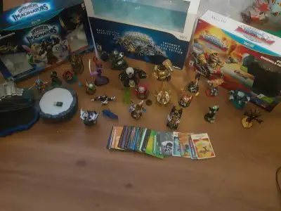 Everything in the photo included. Some cards. Figures 3 different boxes. Some portal Asking $70