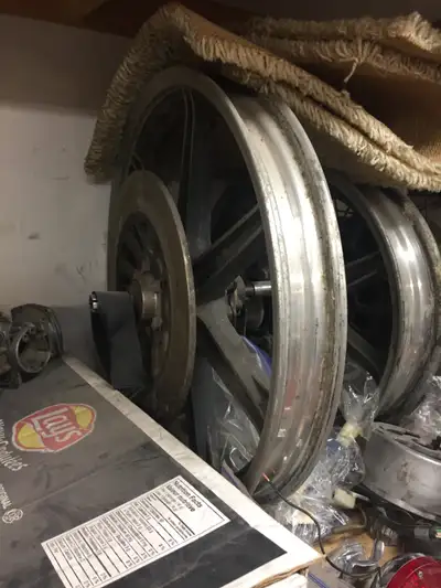 Front and rear mag wheels from a 1980 Yamaha XS 650 Brake rotors, axles, speedometer drive, rear spr...