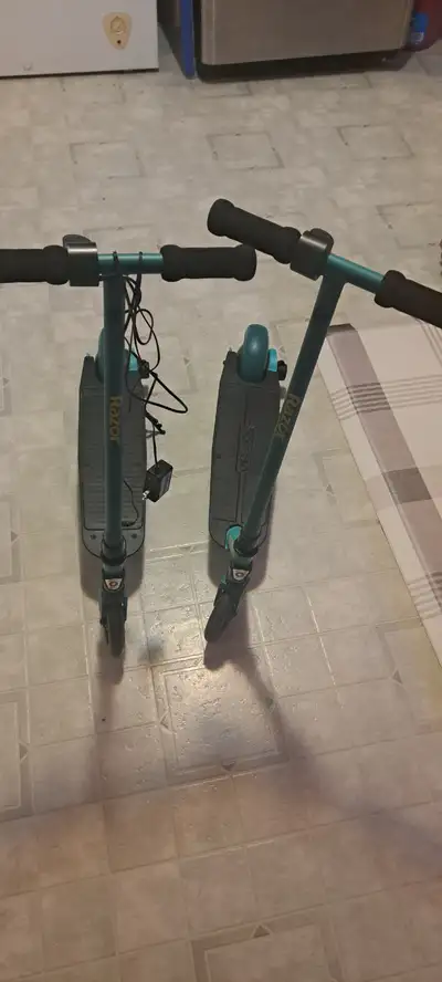 2 electric scooters, View more