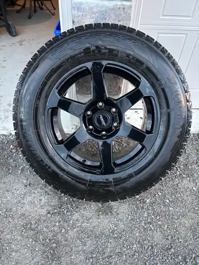 I'm selling a set of American Racing rims paired with Yokohama Ice Guard winter tires, sized at 255/...