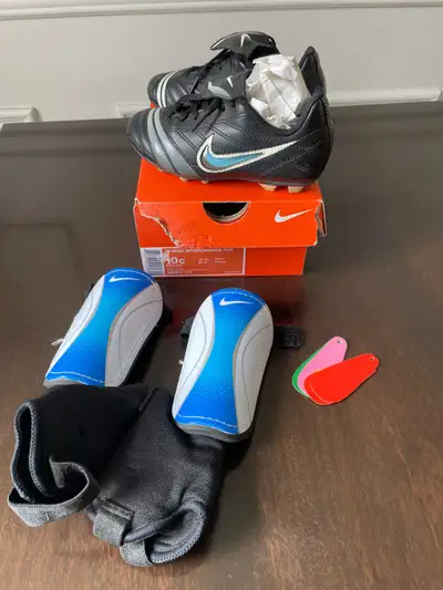 Nike youth soccer cleats with shin guard, View more