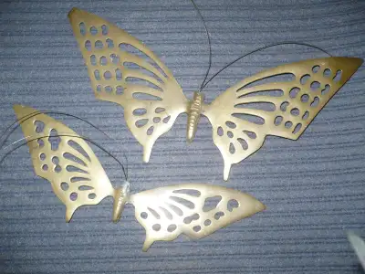 PAIR OF SOLID BEASS BUTTERFLIES FOR YOUR OUTDOOR GARDEN OR WALL DECOR. THE WING SPAN IS APPROX 9 AND...