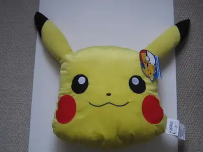 Officially licensed, large stuffed Pokemon Pikachu, new with tags. Approximately, 16 x 16 x 7 inches...