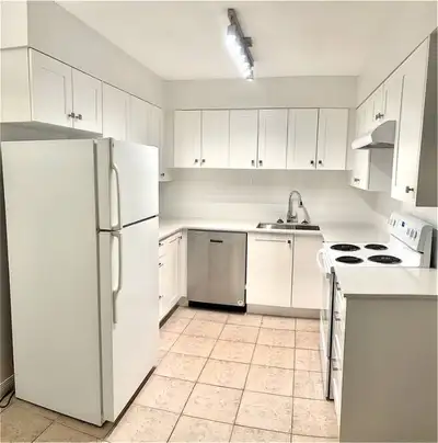 Fully renovated 3 bedroom 2 bathroom available March 15th Utilities and 2 Parkin spots included. Lau...