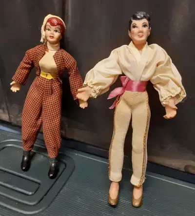 Life like position and painted faces. 6.5" tall. This pair of vintage 1950s rubber flagg internation...