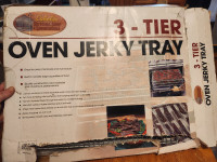 Cabelas jerky gun and jerky oven trays . Never opened