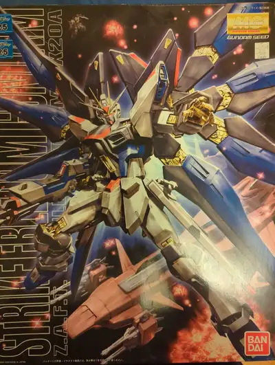 I'm selling a Bandai MG Strike Freedom Gundam model kit. As you can see from the pictures, the model...