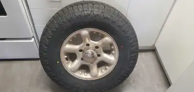 Brand new extra load tire max psi 50 lbs aggressive tread. Fits nissan frontier mounted and balanced...
