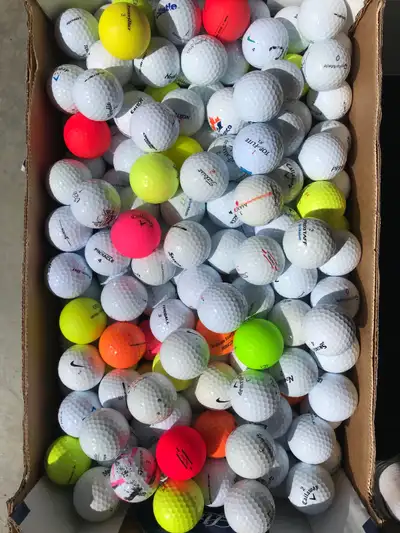 assortment of golf balls, View more