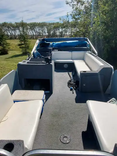 1995 Pontoon boat with 75 horse Honda 4 stroke. New tandem trailer. New tarp,apostery and carpet. Ni...