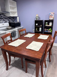 Ashley Dinning table with four chairs for sale