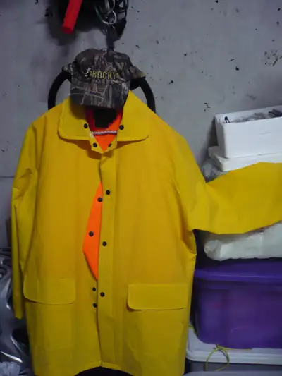 Yellow Rain Jacket & 2 Hunting Vests Rain Jacket - $10 (SOLD) Orange Hunting Vests - $5 each Hunting...