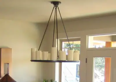New, still in the box, never used, Restoration Hardware candle light chandelier. In the photos you w...