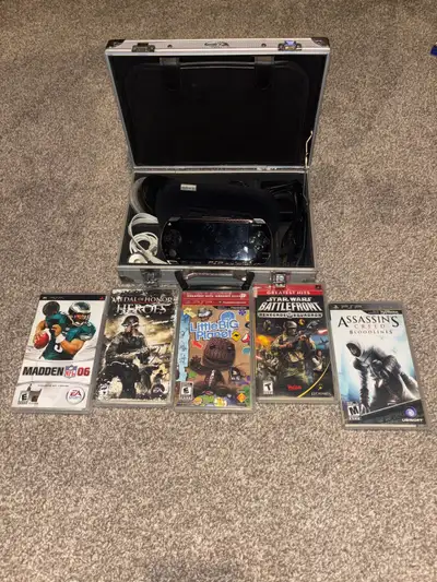 Sony PSP console with Games & accessories, View more