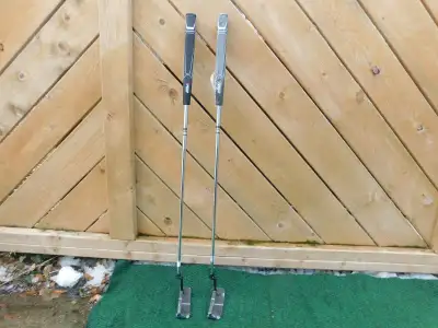 Brand new left hand putters still wrap plastic, View more