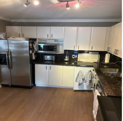 Used kitchen cabinetry. Includes cabinets, quartz countertops and sink. Handles and faucet not inclu...