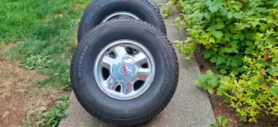 New Tires Michelin Defender LXT-M/S, 265/75r16 Rims are from a 2001 GMC Sierra 1500 4X4. Rims are pe...