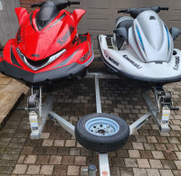 Two PWC Kawasaki Jetskis low hours plus aluminum trailer 