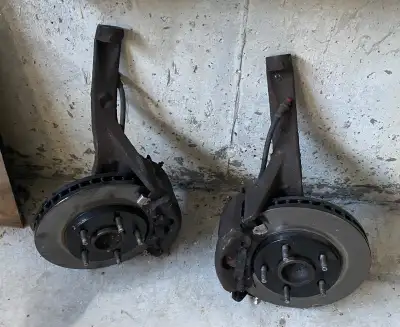 Complete… knuckles, wheel bearings, pads, rotors, flex lines and callipers. Came off 1993 Camaro, wi...