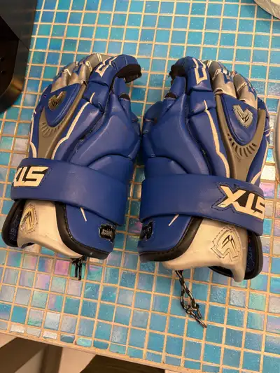  lacrosse gloves Small hole in thumb Good shape Quality gloves, View more