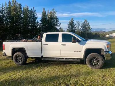 Crew cab long box duramax runs good drives good. 198000km still goin up. Has dent in box as seen in...