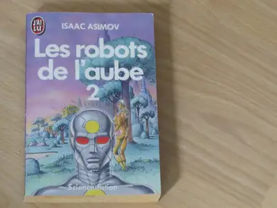 DE ISAAC ASIMOV- vintage fiction format poche **LES ROBOTS DE L'AUBE 2 254 pages Quand Elijah Baley,...