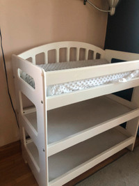 Diaper changing table with shelves