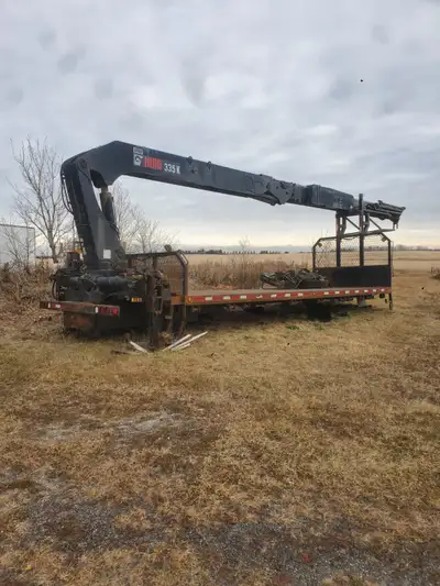 With remote control and front outriggers, deck and no forks