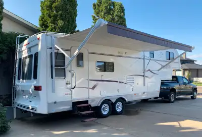 We’re moving and must sell our 28’ fifth-wheel trailer, a cozy home on wheels with all the comforts...