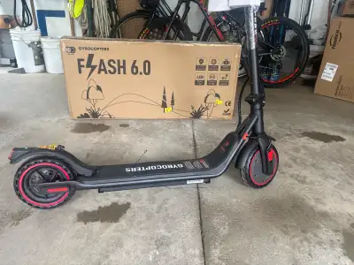 Gyrocopter E-Scooter Flash 6.0 (2026) Brand New and never used. The Flash 6.0 Offers 150/350 watts o...