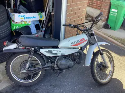 Selling a vintage 1979 Yamaha MX 100 dirt bike, a classic off-road machine with a 98cc, air-cooled,...