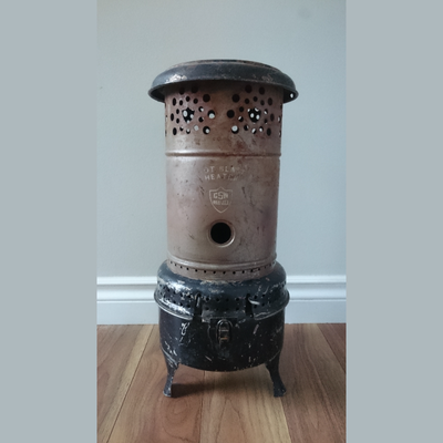 Vintage "GSW Hot Blast Heater" kerosene stove. Made by General Sheet Metal Works (GSW) of Hamilton,...