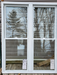New jeldwen double hung window 55 w x  68 h