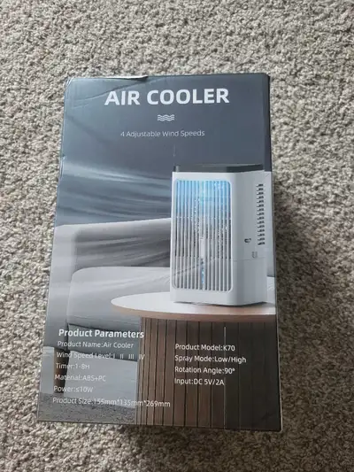 This is a new personal air cooler with 4 adjustable wind speeds, a spray mode, an 8-hour timer, 90°...