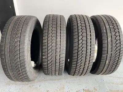 Ovation W586 235/65/17 Winter tires. DOT 2122 Used for two years, car is sold. Priced to sell.