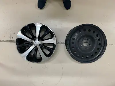 Off of a 2016 Kia Sorento, two rims: A steel 18 x 7.0 used about half a winter and an aluminum 18 x...