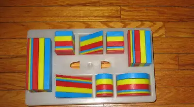 Attriubute blocks in a plastic Tote, View more