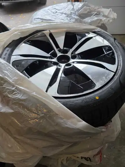 Brand new winter tires on rims, performance vehicle winter tires and rims, never used Brand new - no...