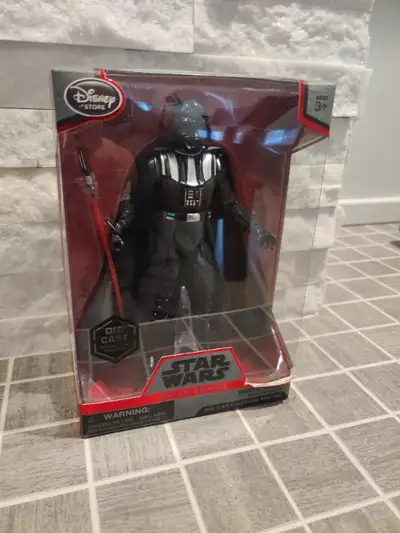 Star Wars Elite Series Darth Vader die cast action figure. Never opened . new in box.